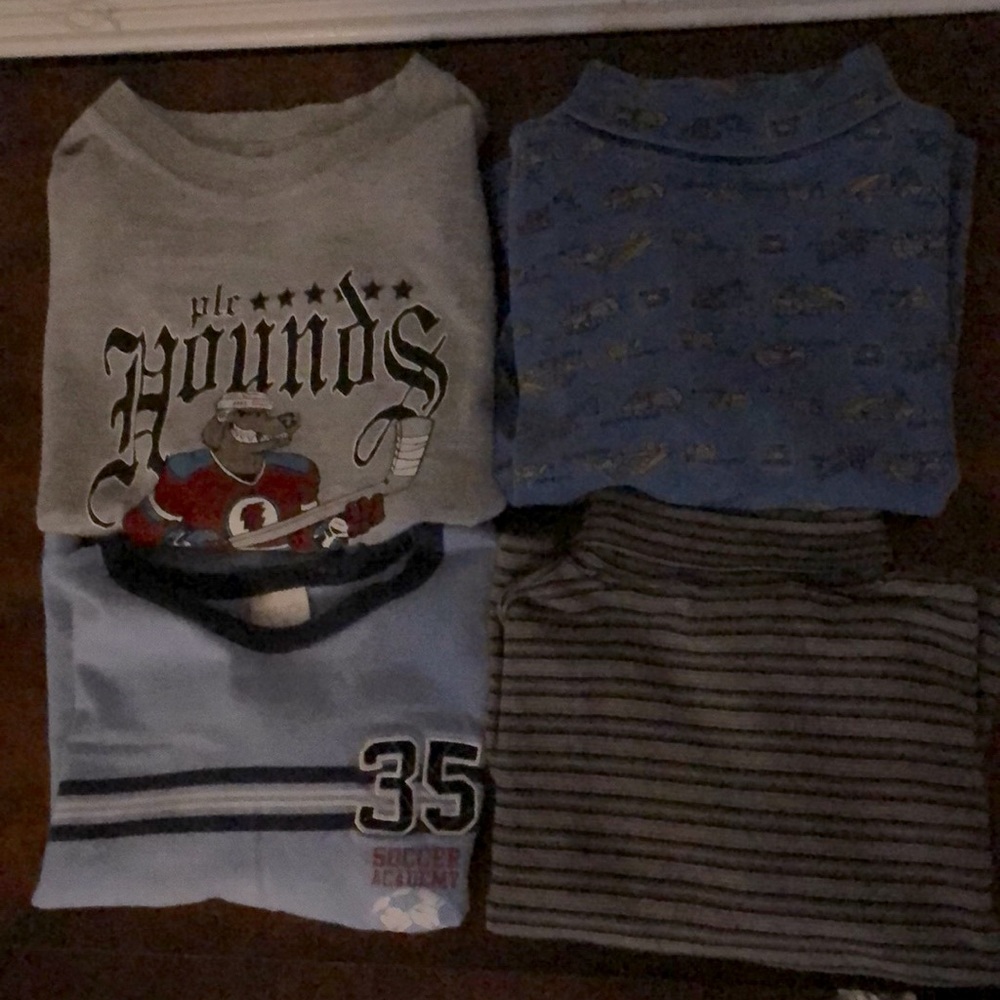 (4) 4T long sleeve shirts.